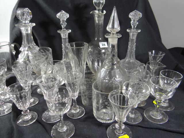 A large parcel of antique English glasses and decanters