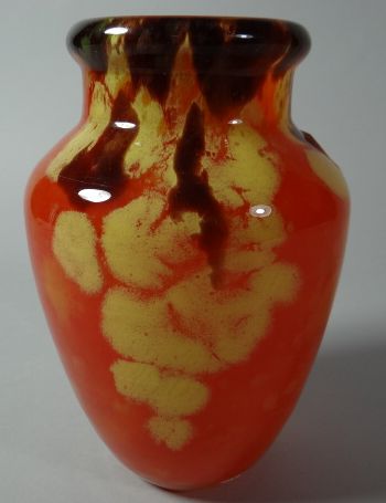 A Charles Schneider French art glass vase of baluster-form with narrow flared neck, in mottled and