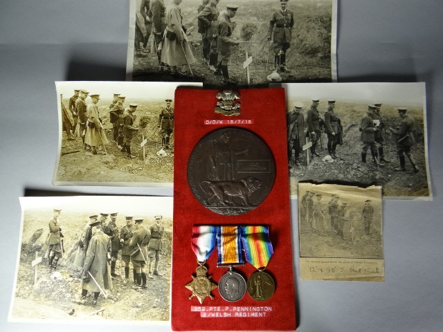 A 1914 trio with Death Plaque, commemorative scroll and official photographs of the King by his