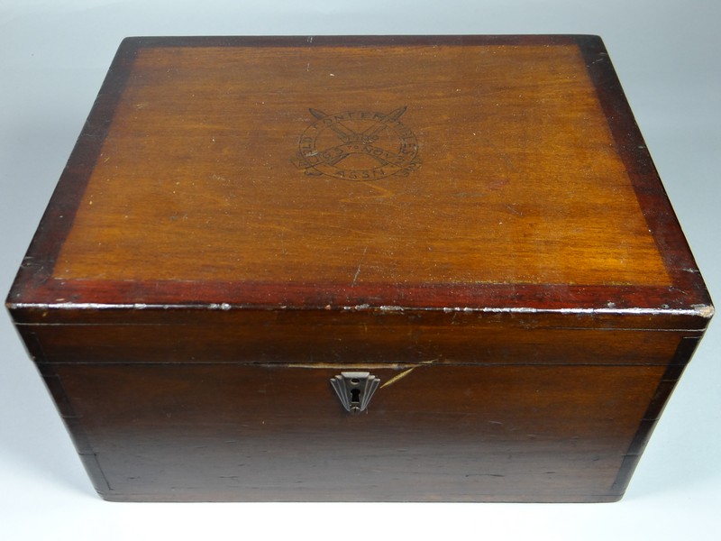 A 1914 Veteran`s wooden chest and padded silk chest with Old Contemptibles 1914 Aug 5 to Nov 22