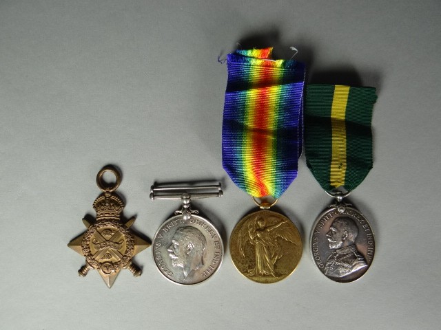 A 1914 Star trio and Territorial Force Efficiency Medal to Sjt. J.P. James, N. Som. Yeo. 1914 Star