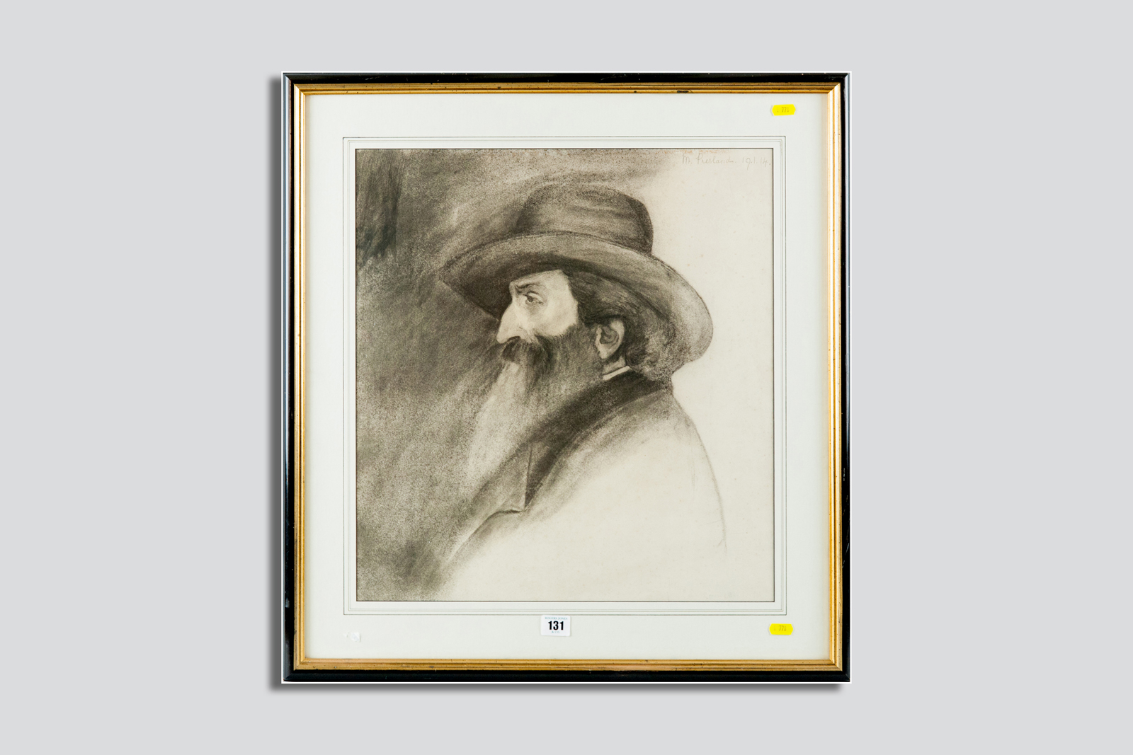 A framed charcoal - head and shoulders study of a bearded gentleman in a hat and an overcoat,