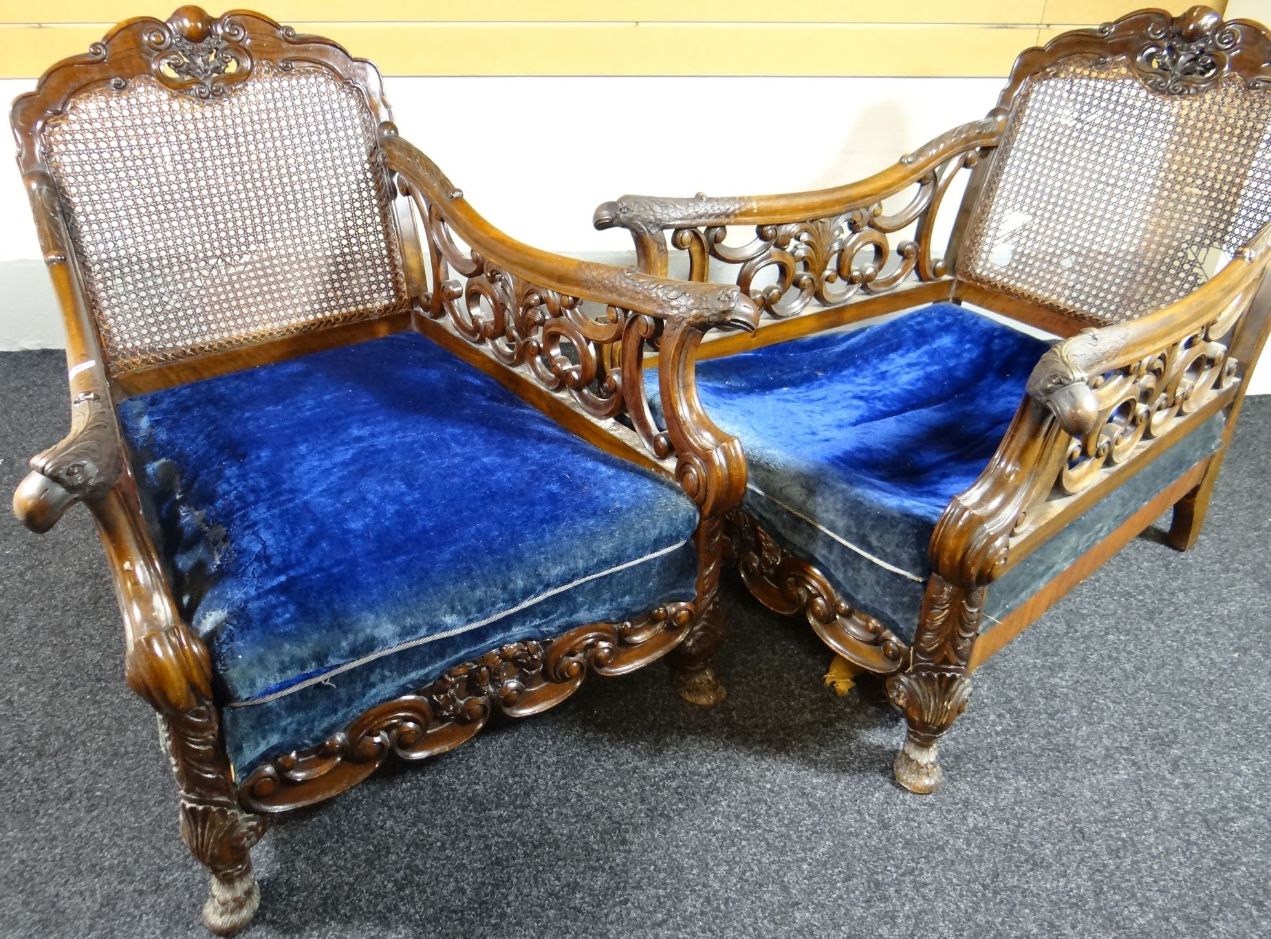 A pair of good late Victorian bergere armchairs, mahogany framed and with cane backs, the arms