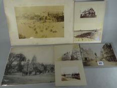 Five old black and white / sepia photographs of South Wales scenes including Tenby beach, Porthcawl