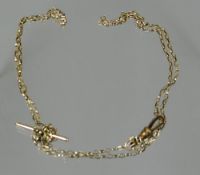 An unmarked believed 9ct fine necklace with t-bar, 8gms