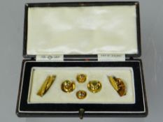 A cased Edwardian 18ct yellow gold cuff-links and studs set, 12gms