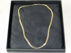 A modern 9ct yellow gold flat necklace, 10gms