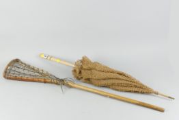 A lacrosse net and a ladies parasol of silk and woven thread
