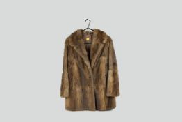 A ladies silk lined fur jacket