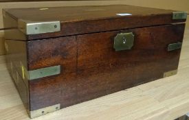 A nineteenth century brass mounted mahogany lapdesk, having a felt lined interior, fitted