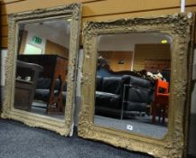 Two early twentieth century `shabby-chic` mirrors in fancy gilt frames