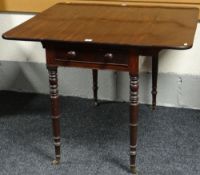 A Victorian dark mahogany Pembroke table on turned supports and with two drawers, 36ins x 34ins