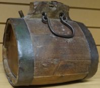 A French oak rustic wine barrel of teardrop-shape with iron bands and fittings, 10ins long