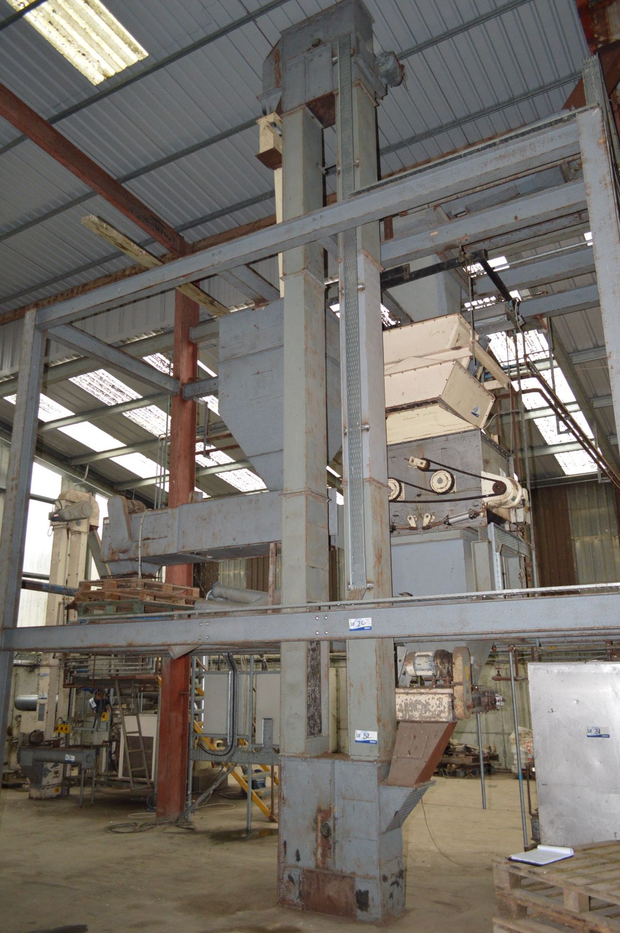 300mm BELT & BUCKET ELEVATOR, approx. 8m centres high, with electric motor, shaft-mounted torque-arm