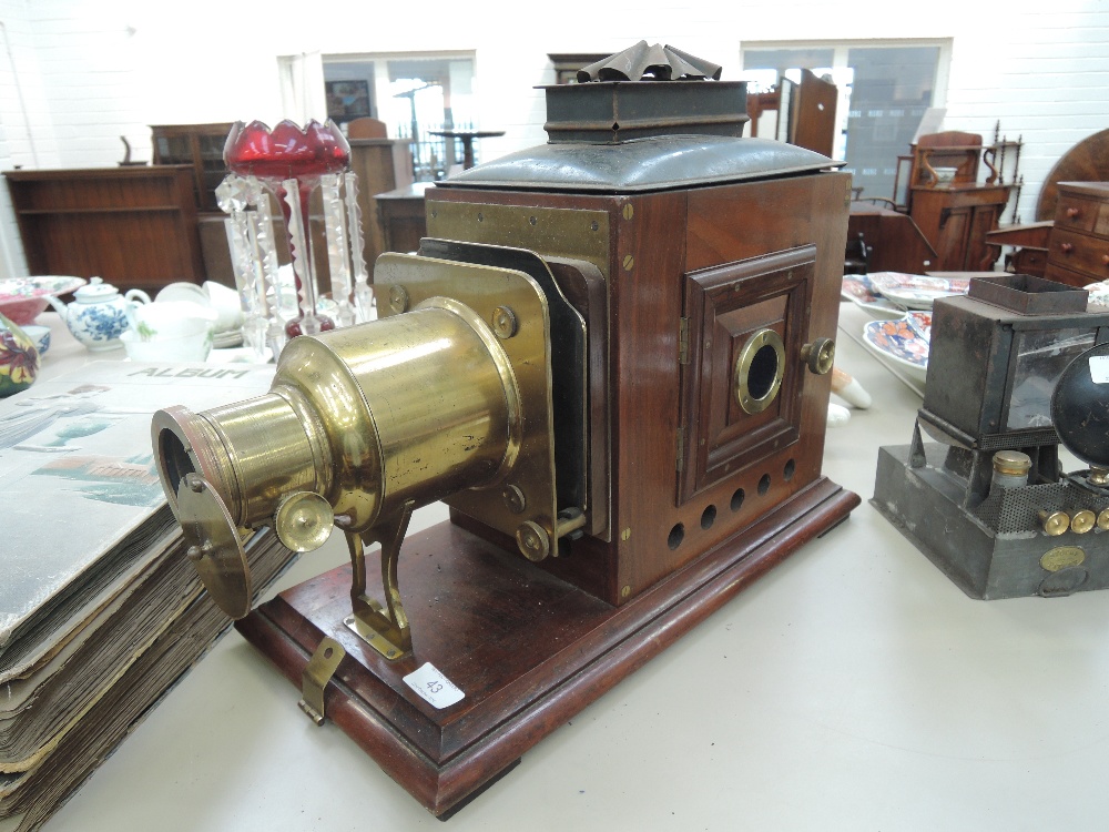 A Victorian mahogany and brass magic lantern of traditional design