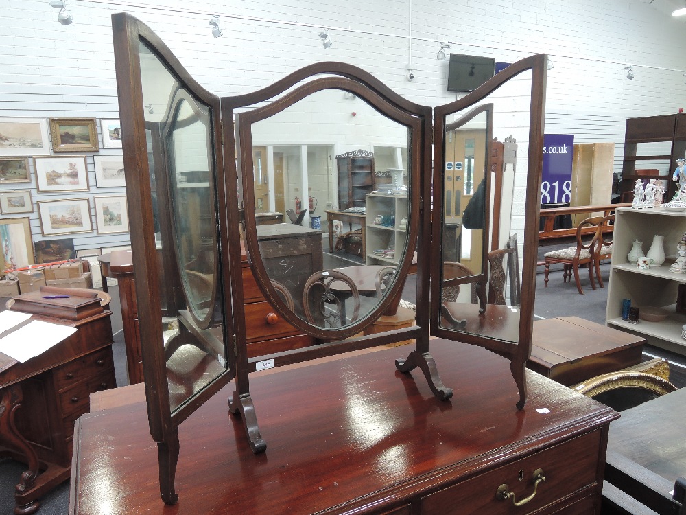 An Edwardian mahogany dressing table triptych mirror on cabriole legs