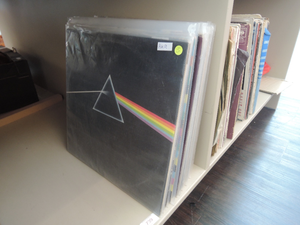 A selection of vinyl LP records, including Pink Floyd, U2, New Order etc