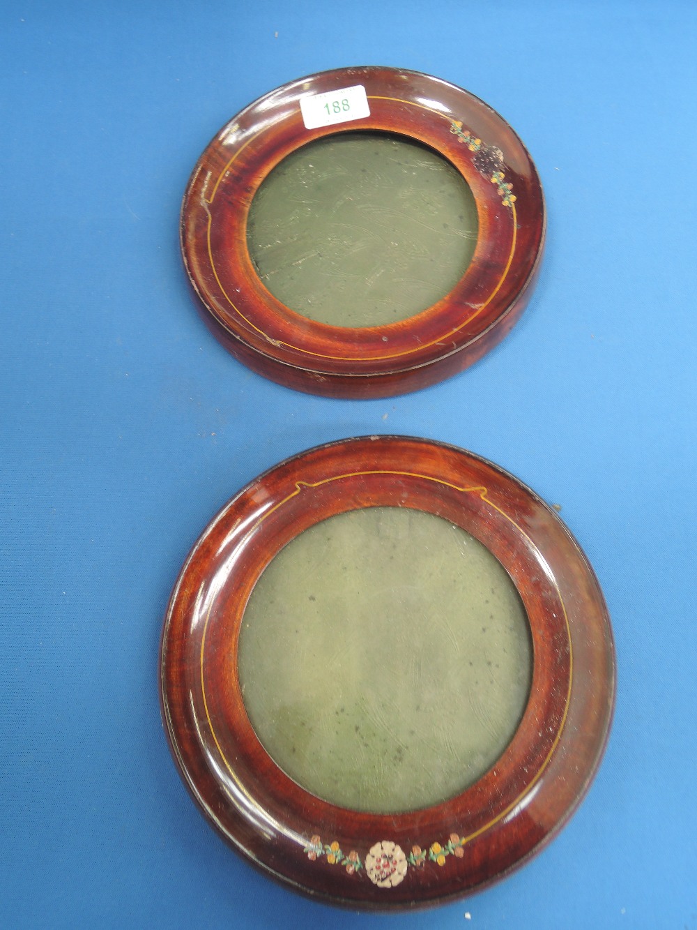 A pair of Edwardian circular photo frames