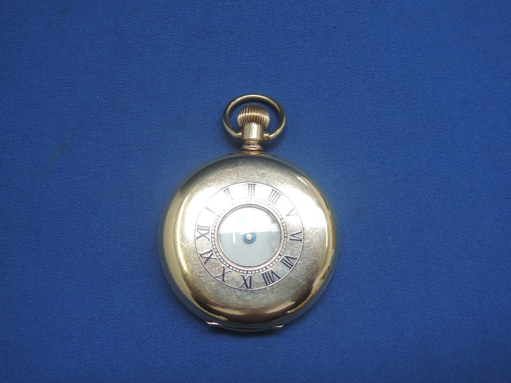 A gold plated top wound Half Hunter pocket watch having Roman numeral dial with subsidiary seconds