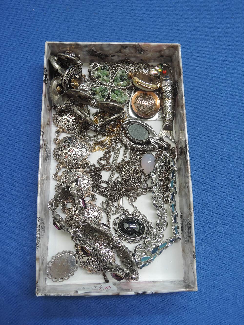 A small selection of costume jewellery including hematite pendant, German bracelet etc