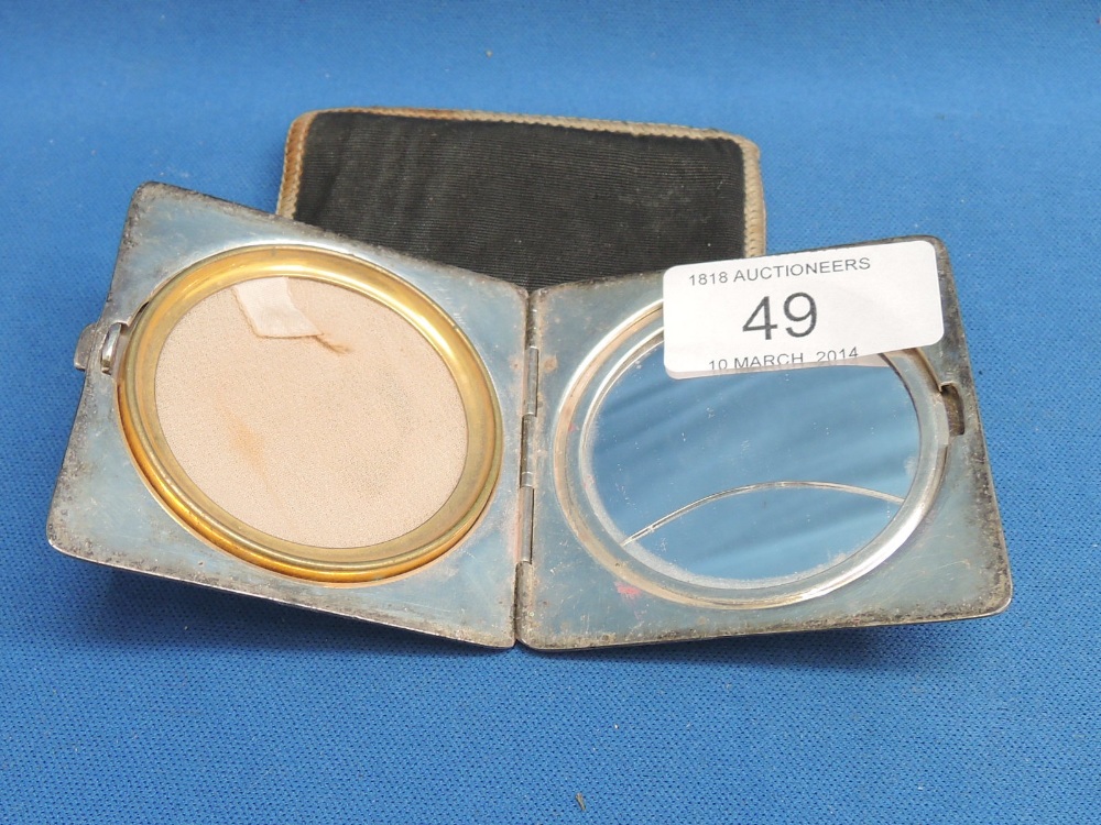 A silver compact of square form having engine turned decoration, Birmingham 1937, possibly Crisford