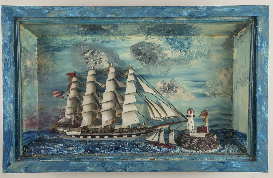 AMERICAN NAUTICAL PAINTED DIORAMA OF A SCHOONERCirca 1900The four-mast schooner in coastal waters,