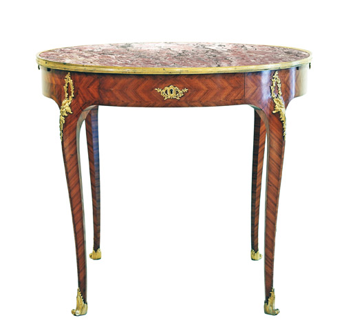 LOUIS XV/XVI GILT-BRONZE MOUNTED MARBLE TOP KINGWOOD CENTER TABLE, CIRCA 1900 Of circular form,