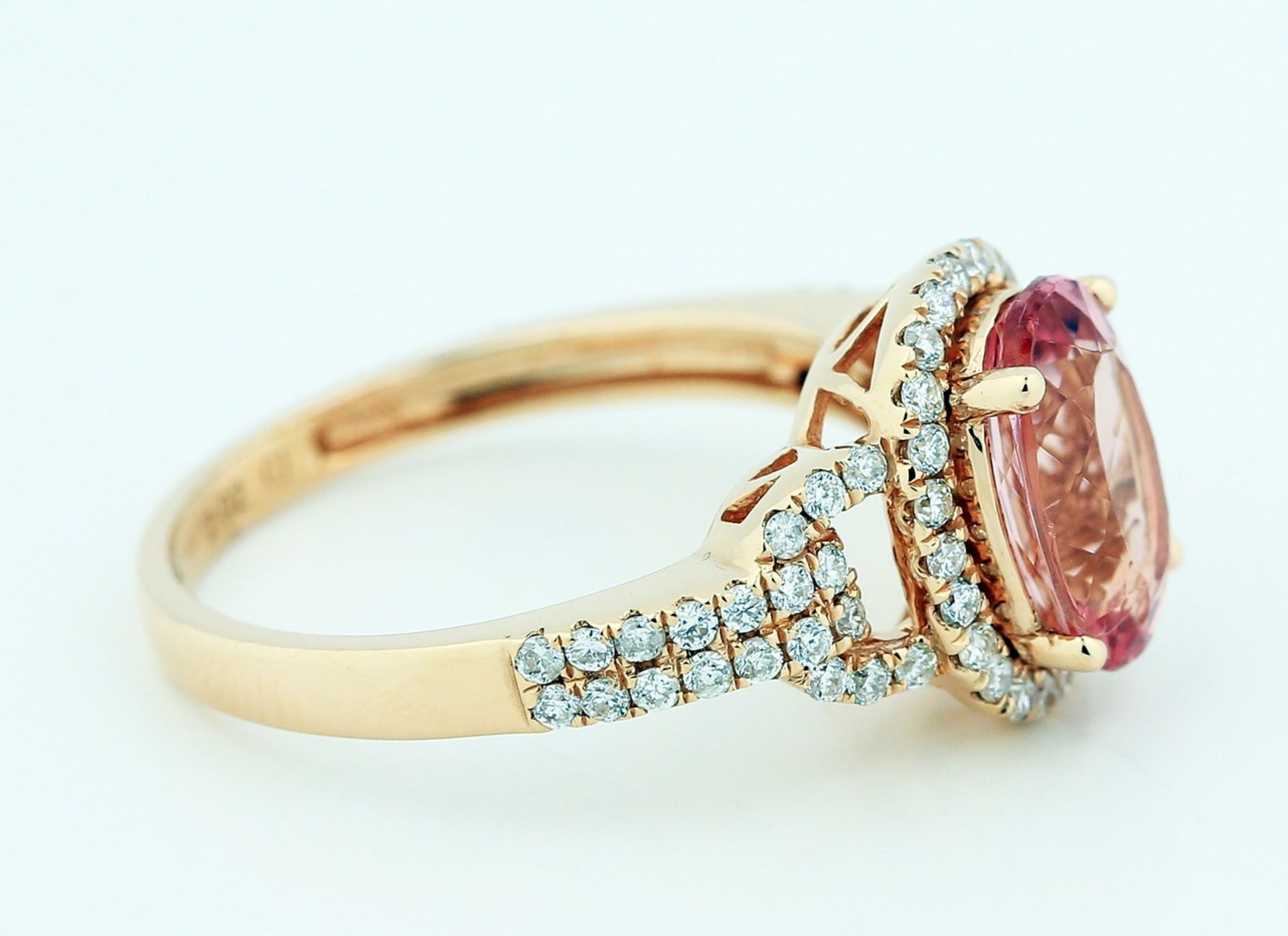 SPINEL AND DIAMOND RING Spinel and Diamond Ring Centering an oval-cut pink spinel weighing - Image 2 of 4