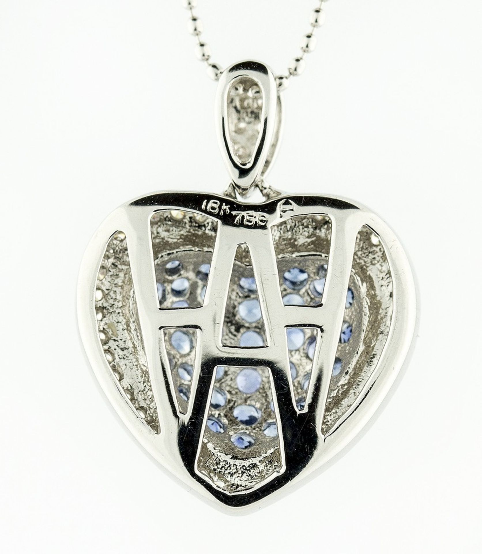 SAPPHIRE AND DIAMOND 'HEART' PENDANT Centered pavi-set sapphires weighing approximately 0.54 carats, - Image 2 of 2