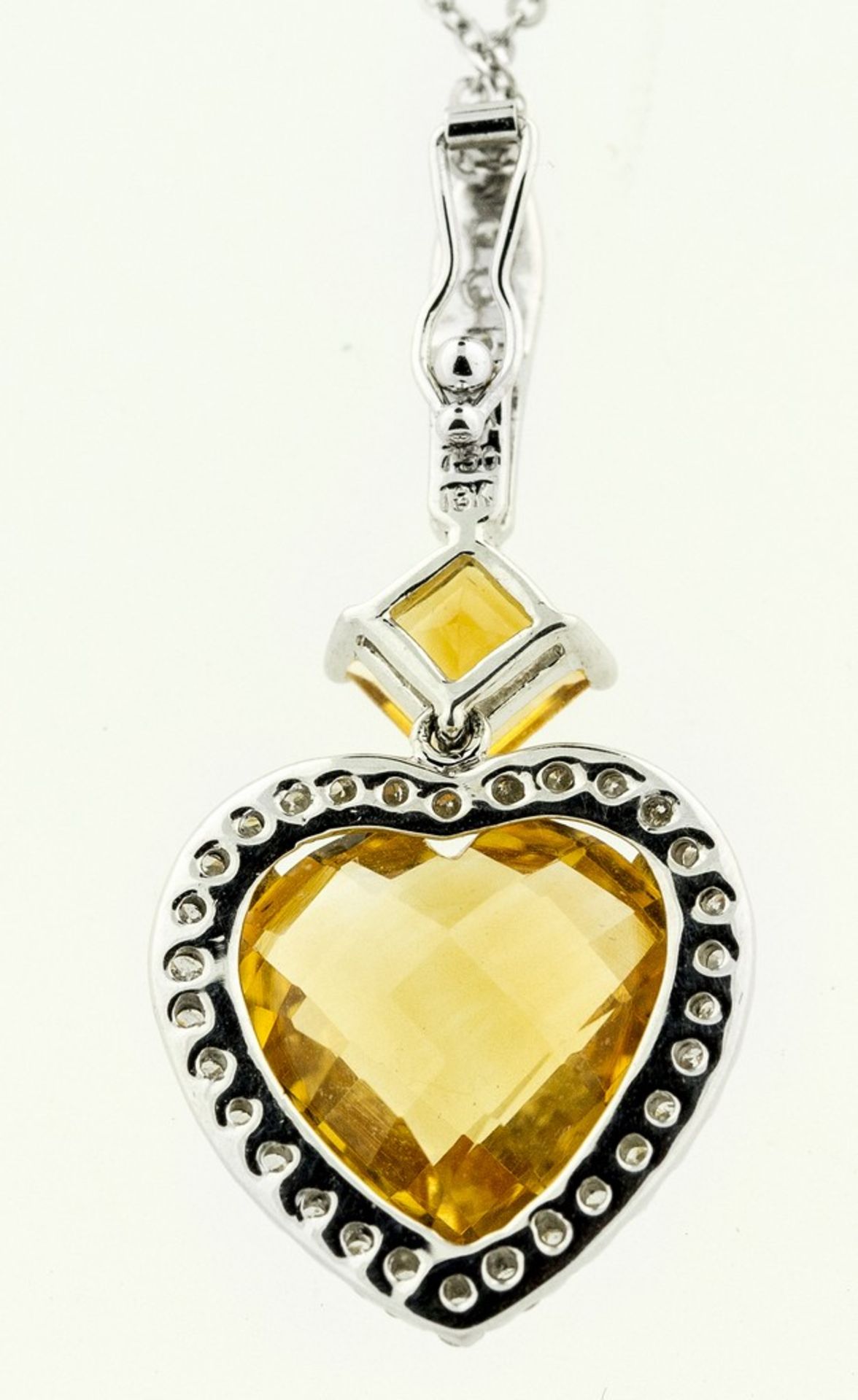 CITRINE AND DIAMOND PENDANT-NECKLACE Suspending a pendant set with a heart-shaped citrine and a - Image 2 of 2