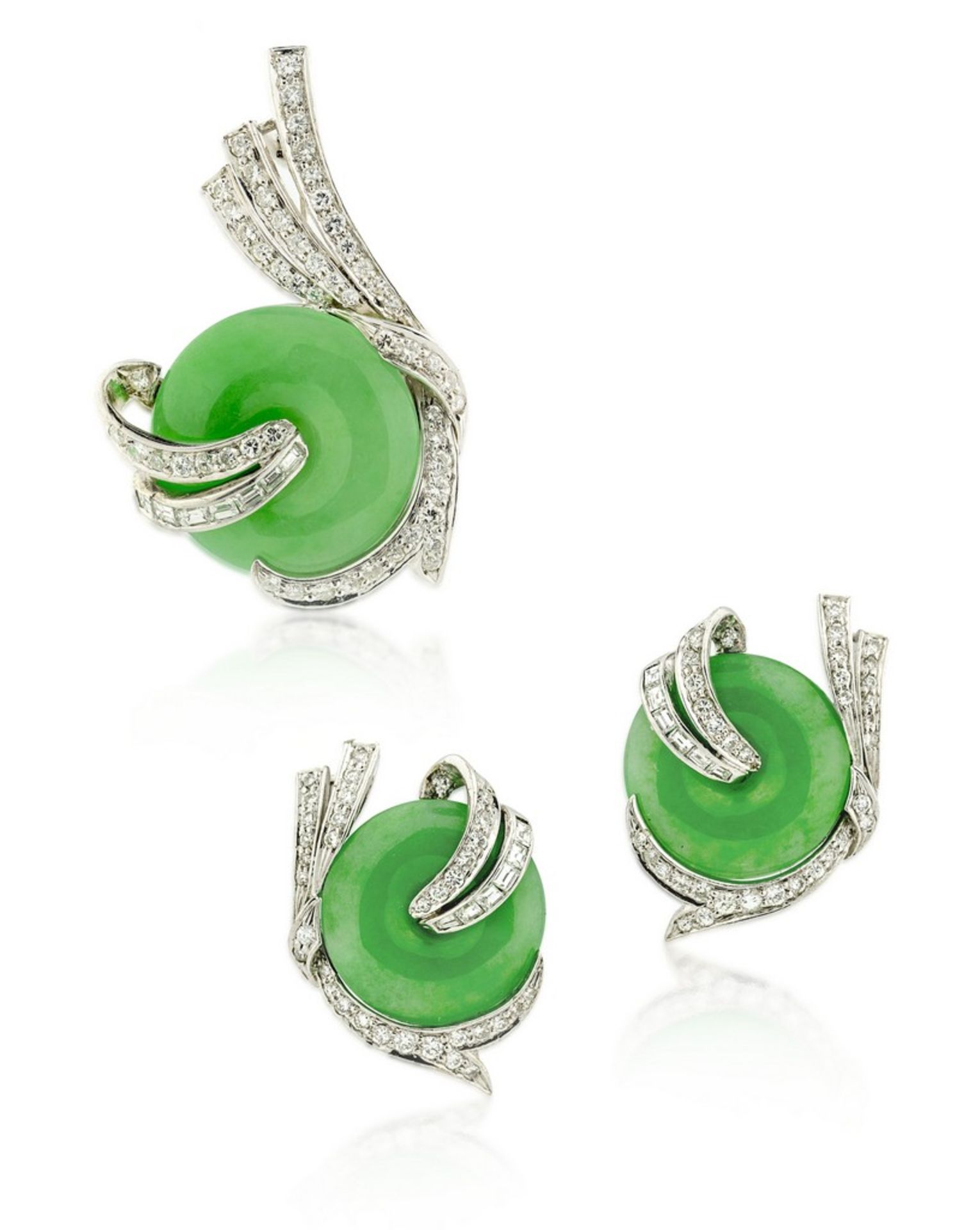 JADE AND DIAMOND EAR CLIPS AND PENDANT-BROOCH Containing a pair of ear clips and pendant-brooch, the