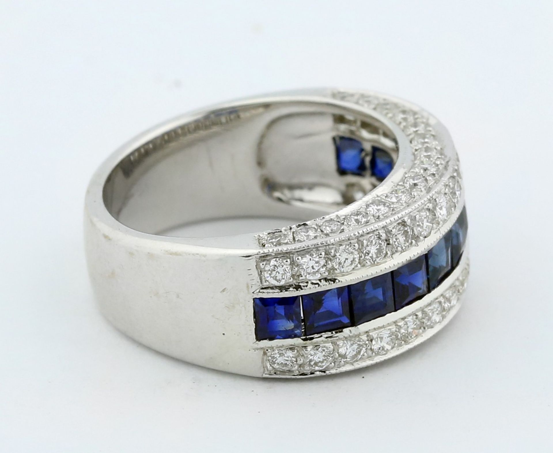 18 KARAT WHITE GOLD SAPPHIRE AND DIAMOND RING The band ring set with calibri-cut sapphires, - Image 2 of 5