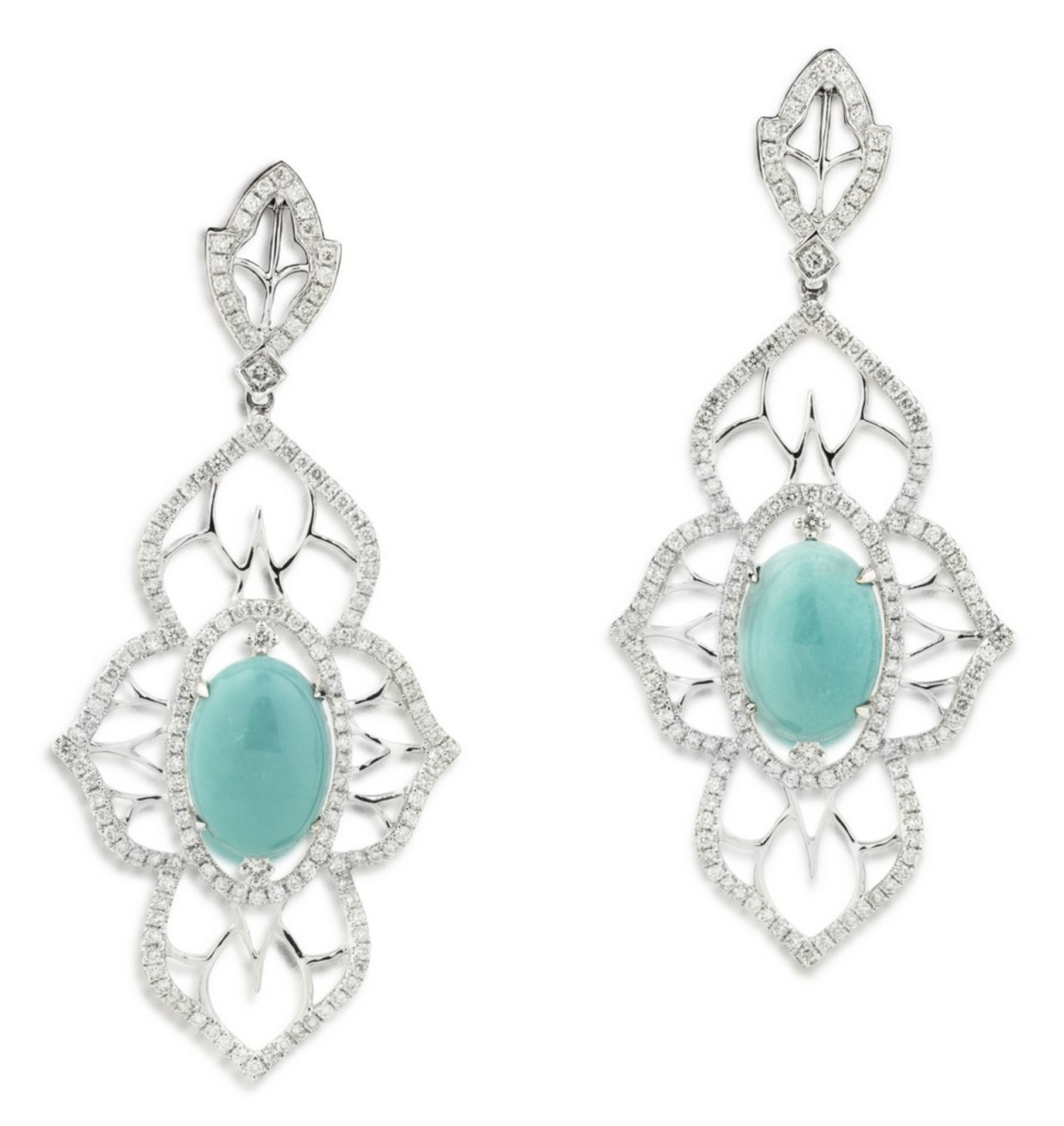 PAR OF TURQUOISE AND DIAMOND CHANDELIER EARRINGS Centered an oval-shaped cabochon turquoise weighing