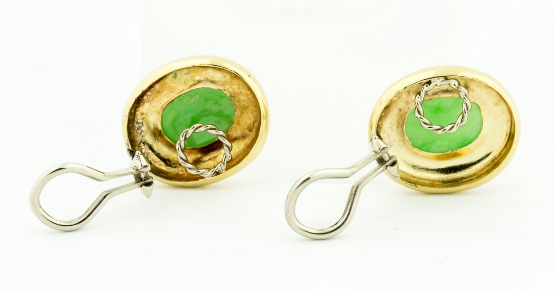 YELLOW GOLD JADE EAR CLIPS Centering an oval cabochon-cut green jade, surrounded by a gold frame, - Image 2 of 2