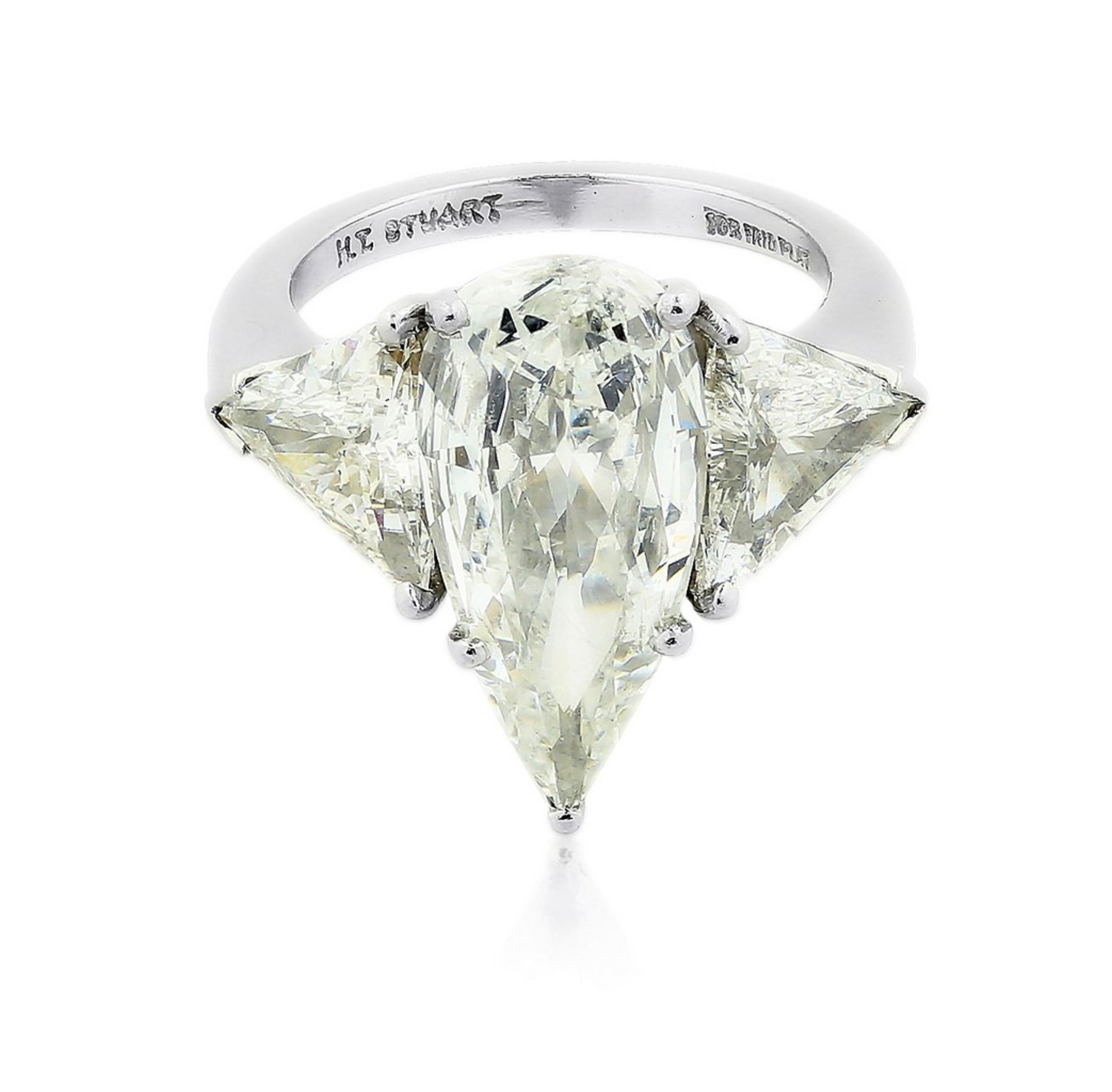 4.01 CARAT DIAMOND PLATINUM RING Centered by a pear-shaped diamond weighing 4.01 carats, flanked