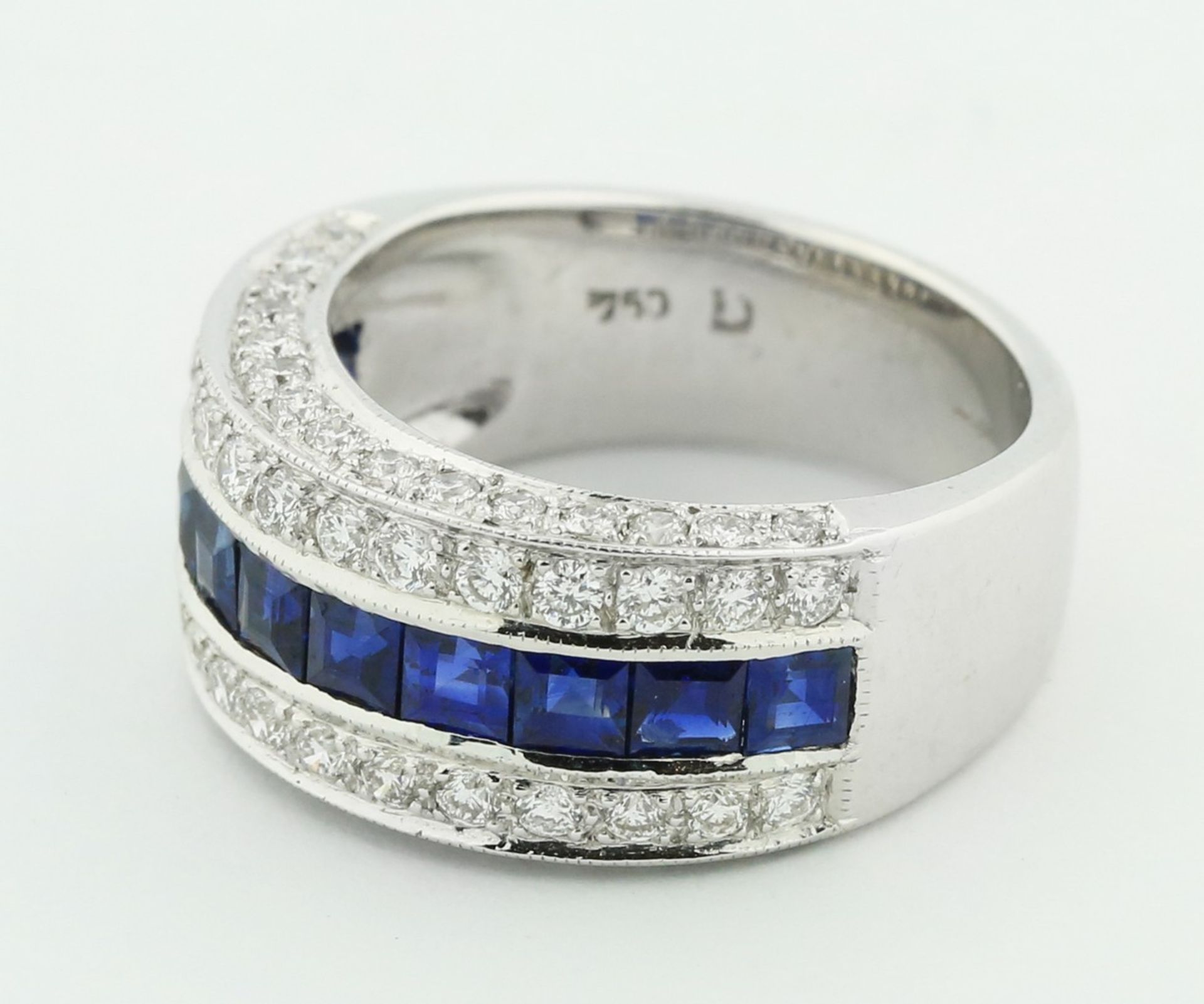 18 KARAT WHITE GOLD SAPPHIRE AND DIAMOND RING The band ring set with calibri-cut sapphires, - Image 4 of 5