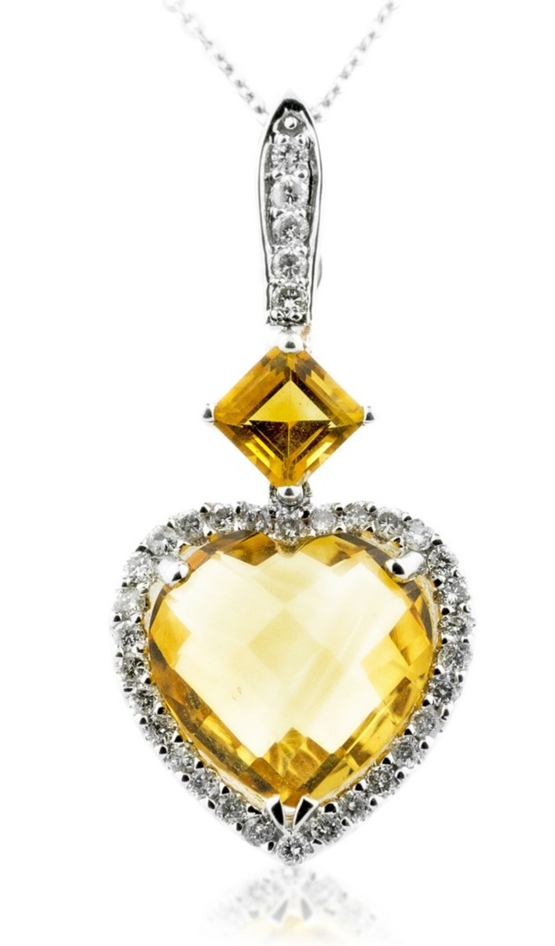 CITRINE AND DIAMOND PENDANT-NECKLACE Suspending a pendant set with a heart-shaped citrine and a