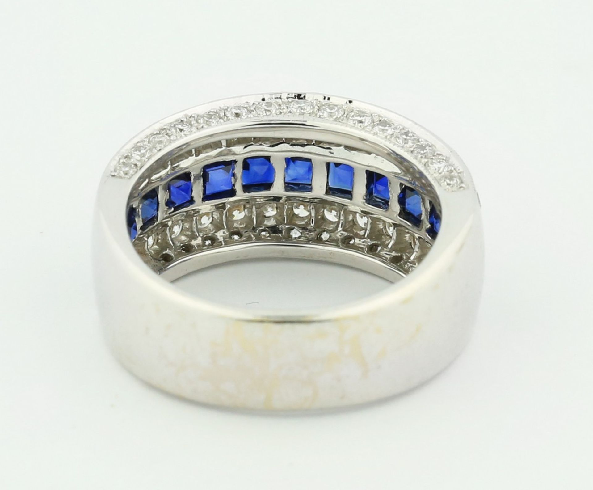 18 KARAT WHITE GOLD SAPPHIRE AND DIAMOND RING The band ring set with calibri-cut sapphires, - Image 3 of 5