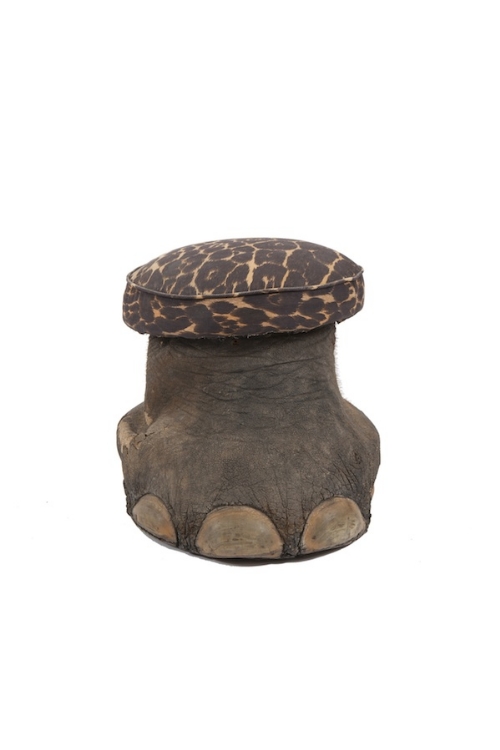 A VICTORIAN ELEPHANT FOOT, modelled in the form of a stool and mounted with circular cushion 
38cm
