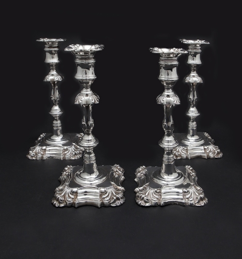 A MATCHED SET OF FOUR VICTORIAN GEORGIAN STYLE CAST SILVER CANDLESTICKS, Sheffield 1840 (x 2) and