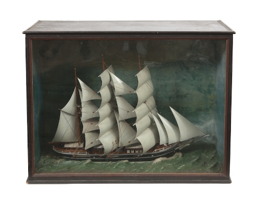 A CASED MODEL OF A THREE-MAST TALL SHIP, 19th Century, with canvas sails and timber rigging.  90cm
