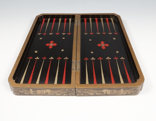 A CHINESE EXPORT FOLD-OVER CHESS BOARD, decorated in black and gilt, of rectangular form, with re-