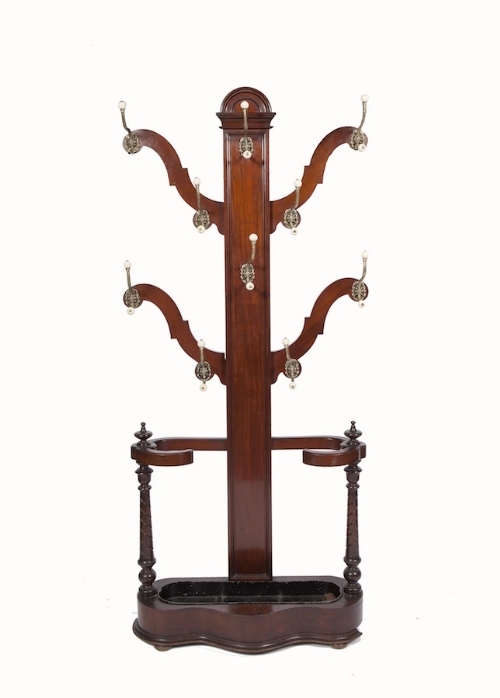 A VICTORIAN MAHOGANY HALL STAND OF TREE FORM, with four branches and having applied porcelain