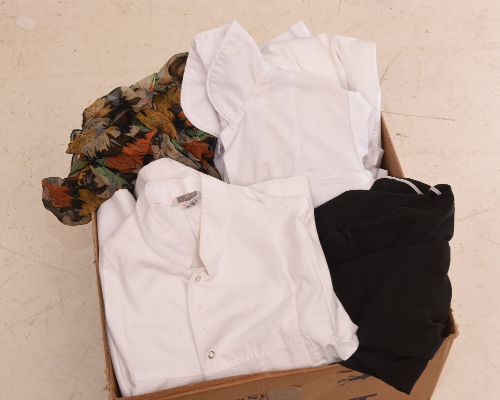 A box of clothing inc. chefs whites, sports shorts and tops,  dresses etc.