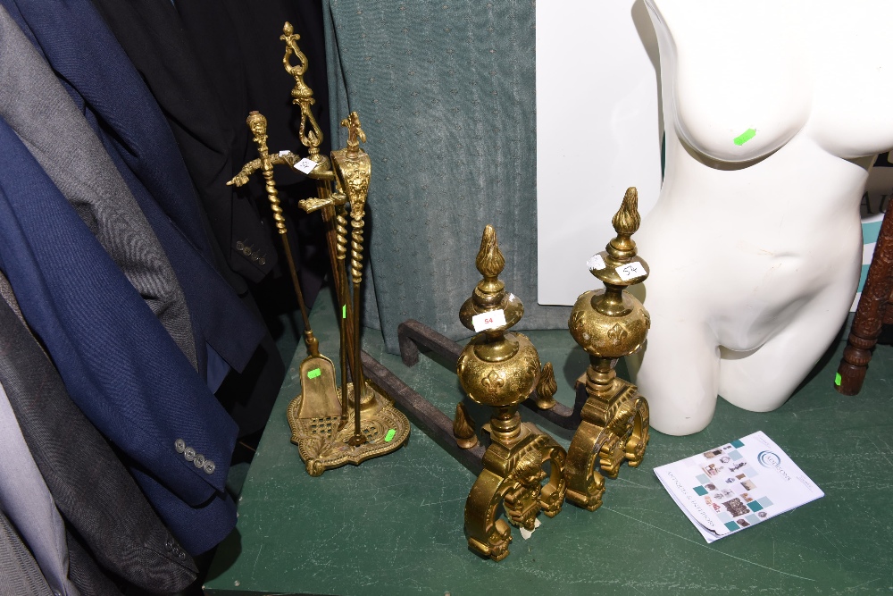 A 19th century gilt metal companion set tog. with a pair of andirons