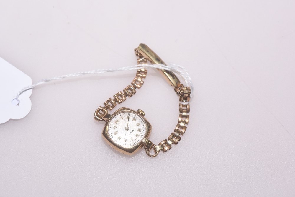 A vintage Vertex lady`s 9ct gold cased wristwatch, with silvered dial and Arabic numerals, Swiss