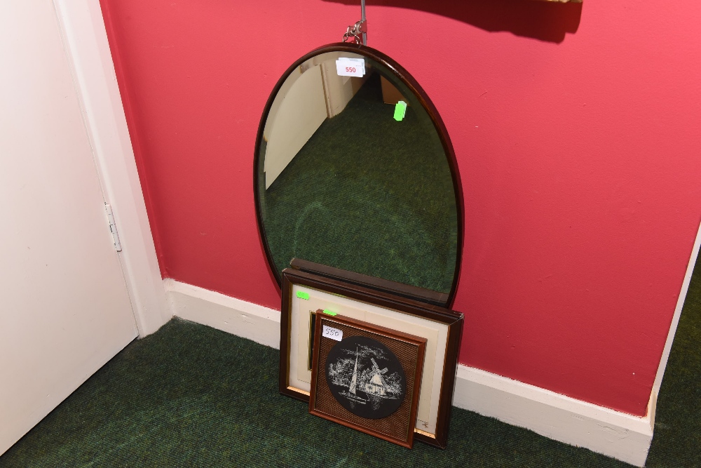 A group of framed articles inc. mirror