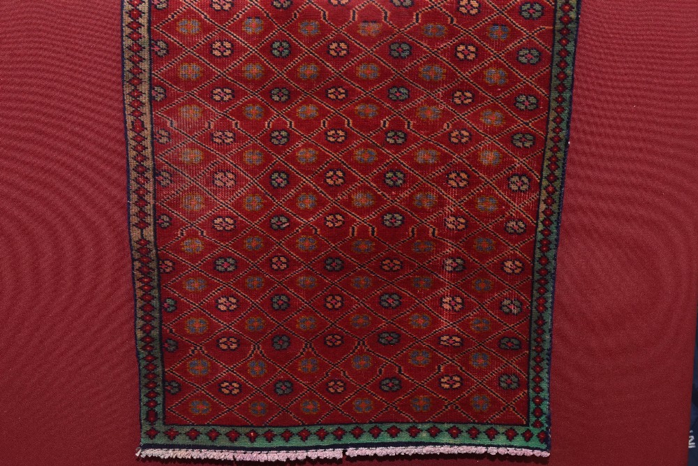 An antique Kazak rug, early 20th century, 1.90m by 1.40m