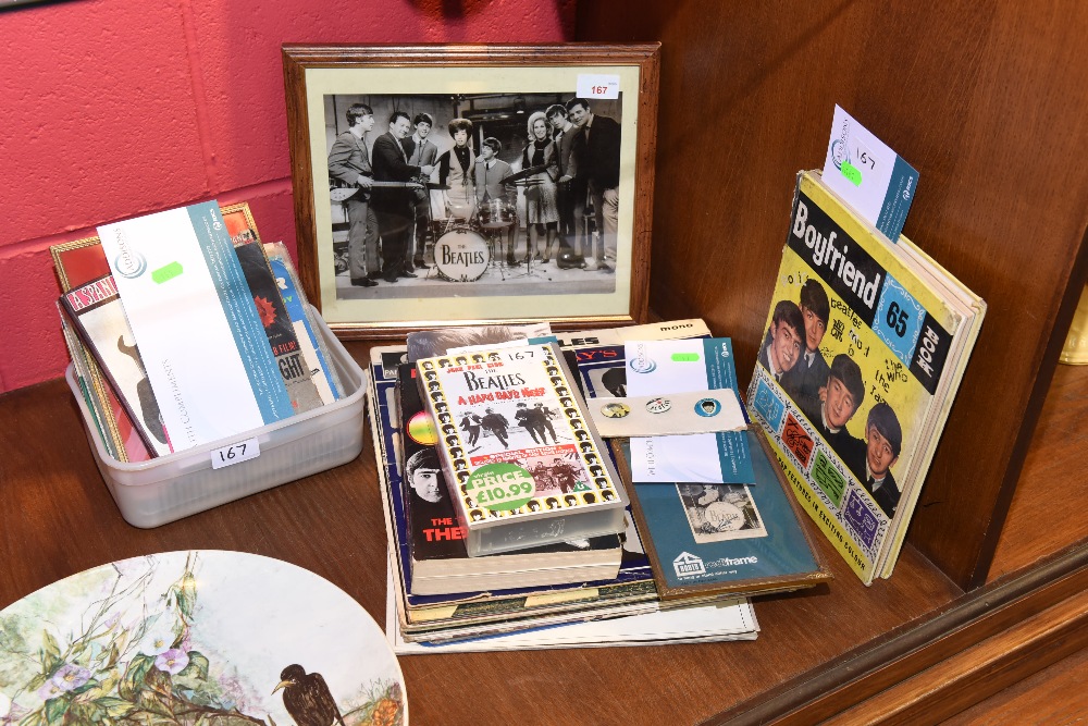 A group of Beatles memorabilia inc. LP`s, books, photographs etc