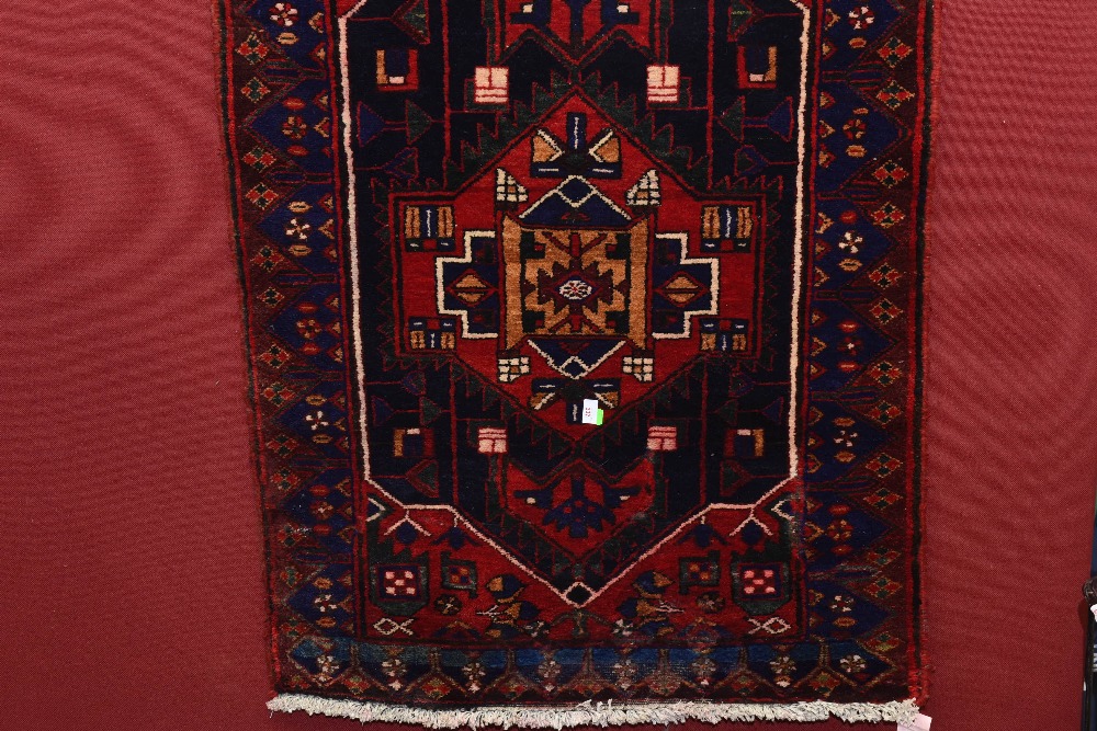 A Kurdish rug, 1.50m by 1.00m